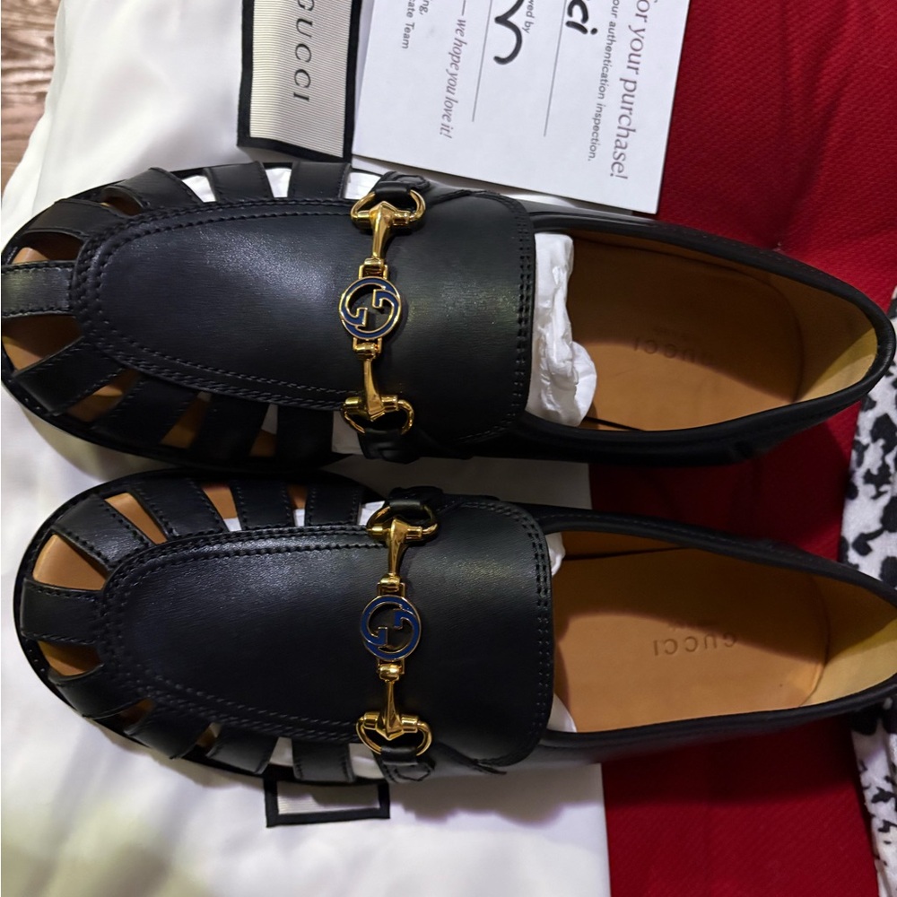 Gucci Black Loafers with Gold Hardware